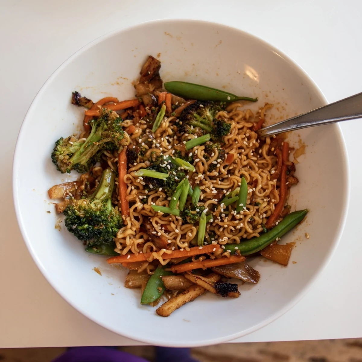 A quick and easy Ramen Noodle Stir-Fry Remix showcases noodles, veggies, and savory sauce, perfect for dinner.