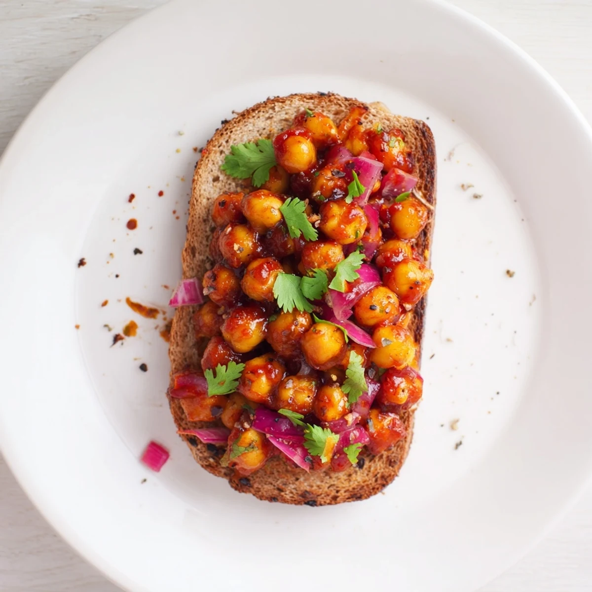 Golden, toasted bread piled high with juicy BBQ chickpeas, a flavorful vegan lunch.