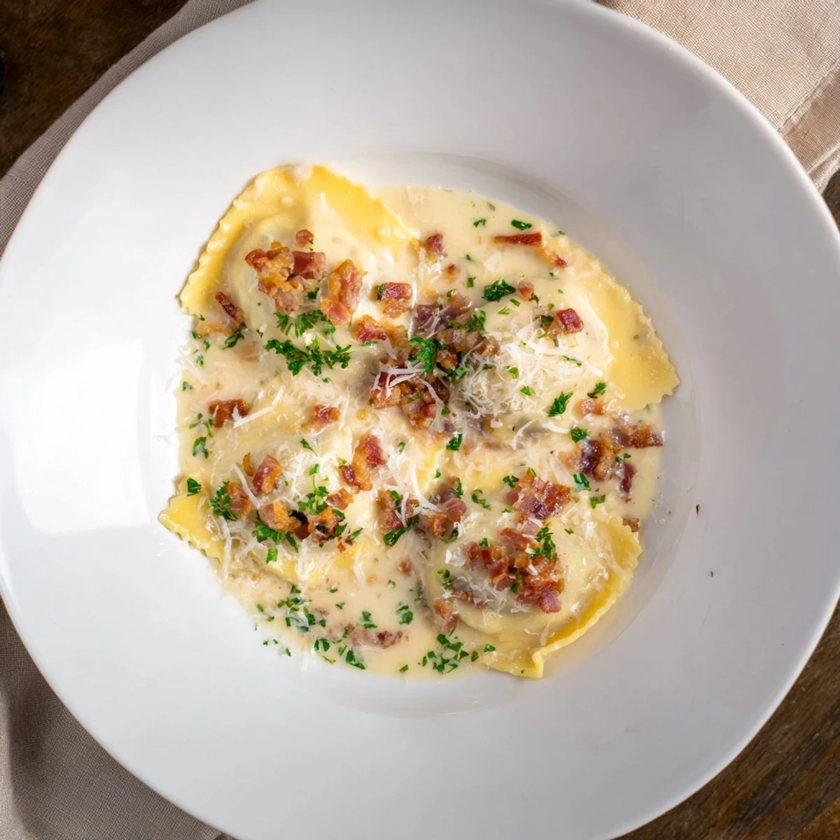 A close-up shot of steaming Olive Garden Ravioli Carbonara, garnished with fresh parsley and Parmesan.