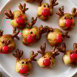 These savory Rudolfs Red Nose Pretzel Bites feature melty cheese inside and pretzel antlers for all the flavor.