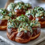 Shamrock pretzel bites with white chocolate, festive St. Patrick's Day treat with green sprinkles and salty-sweet crunch.