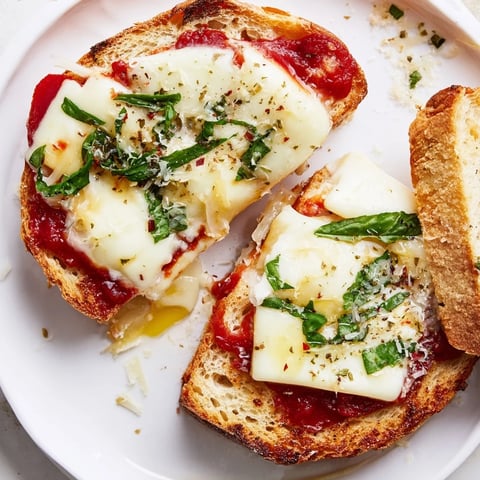 Air Fryer Pizza Margherita Grilled Cheese, with melted mozzarella and fresh basil, ready to eat.