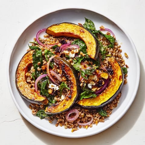 A close-up of a colorful Farro & Mustard Green Salad, showing the textures of farro and greens.