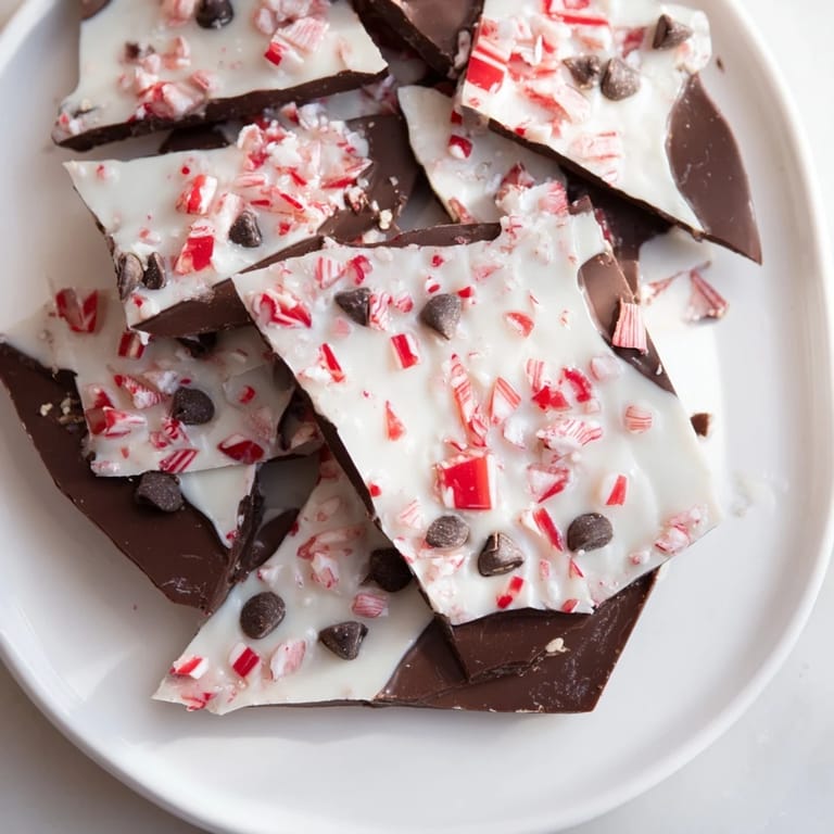 A close-up of festive Peppermint Bark, showcasing layers of flavors and textures, ready to enjoy.